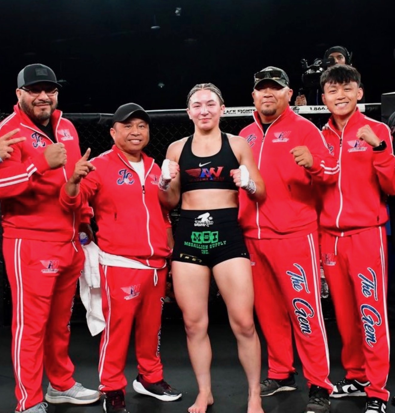 Mavericks-sponsored fight team in custom red warm-ups